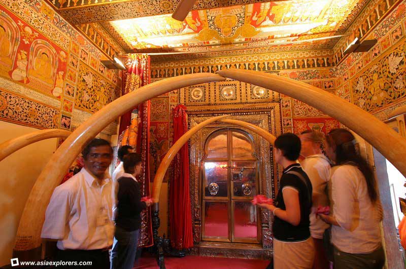 At the Sri Lankan Buddhist Holy of Holies, awaiting to view the Sacred Tooth Relic